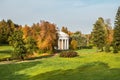 Autumn landscape with temple of Friendship is in Pavlovsk Park. St. Petersburg, Russia.