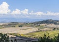 Autumn landscape in Tuscany, Italy with plowed field, vineyards, trees and hills Royalty Free Stock Photo