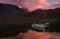 Autumn Landscape  With Two White Boats Of The Rescue Service Against The Backdrop Of The Reflection Of  Triglav Mountains,  Fiery Royalty Free Stock Photo