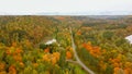 Aerial View of Autumn Landscape View of the Autumn Bright Multi-colored Trees, Green, Orange and Reddish Tint. Royalty Free Stock Photo