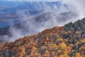 Autumn landscape - view of the mountains covered with forest under the autumn sky in the Carpathians Royalty Free Stock Photo