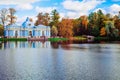 Autumn landscape with view over a garden pavilion `Grotto` and the humpback bridge in the Catherine Park, Pushkin, Saint