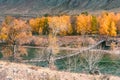 Autumn landscape and wire bridge