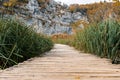 Autumn landscape with a wooden path at Plitvice Lakes National Park, Croatia Royalty Free Stock Photo