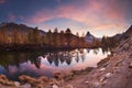 Autumn larches on the background of the Matterhorn and autumn in the Alps. The clear water of the mountain lake Grindjisee is a Royalty Free Stock Photo