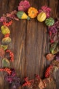 Autumn layout composition frame of dry leaves, branch, yellow green pumpkins and berries on white background, Royalty Free Stock Photo