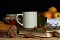 Autumn leaves, cup of coffee, warm scarf, fruits basket Royalty Free Stock Photo