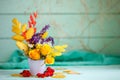 Autumn leaves and flowers on a wooden table. Autumn background with copy space. Autumn still life.