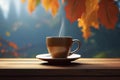 Autumn leaves and a hot steaming cup of coffee. Wooden table and cup of coffee on autumn background. Autumn season, free Royalty Free Stock Photo