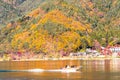 Autumn leaves in Kawaguchiko lagoon at yakisaki park japan.Fujisan mountain