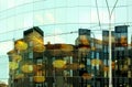 Evening city street on front modern facade  buildings light  reflection on windows glass  blue  blurring on Royalty Free Stock Photo