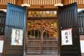 Autumn leaves are projected on the glass door of Japanese temple