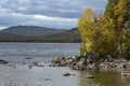 Autumn leaves on rocky shore of Flagstaff Lake, northwestern Mai Royalty Free Stock Photo