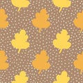 Autumn leaves seamless pattern. Brown background with yellow and orange abstract botanic shapes