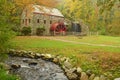 Colorful, misty autumn morning at the Old Mill in Sudbury, Massachusetts