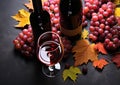 Autumn leaves, wine bottle, grape bunch, wood table generated by AI Royalty Free Stock Photo