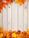 Autumn Leaves on Wooden Board Background, frame with leaves
