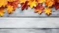 Autumn leaves on wooden table, nature vibrant backdrop generated by AI