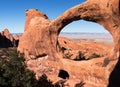 Autumn light on Double O Arch in Arches National Park, Utah Royalty Free Stock Photo