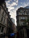 Autumn London day Throgmorton Street and modern buildings with blue sky and little clouds Royalty Free Stock Photo