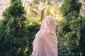 Autumn. Lonely muslim woman in a headscarf walking in a park, garden. Vintage Toned.