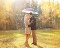Autumn, love, relationship and people concept - kissing couple