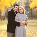 Autumn, love, relationships and people concept - happy couple Royalty Free Stock Photo