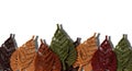 Autumn macrame leaf decorations in warm fall colors against a white background Royalty Free Stock Photo