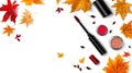 Mascara and makeup products with autumn maple leaves on white background, beauty concept Royalty Free Stock Photo