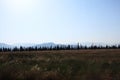 autumn meadows with mountains at horizon Royalty Free Stock Photo