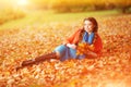 Autumn model, bright make up. woman on background fall landscape Royalty Free Stock Photo