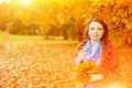 Autumn model, bright make up. woman on background fall landscape Royalty Free Stock Photo