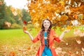 Autumn model, bright make up. woman on background fall landscape Royalty Free Stock Photo