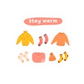 Autumn mood greeting card stay warm with cozy clothes sweater, jumper, hat, socks