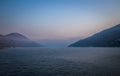 Autumn morning on the river surrounded by mountains