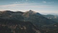 Autumn mountain ranges aerial. Nobody nature landscape. Green pine trees forets on hills, peaks Royalty Free Stock Photo