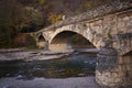 Autumn in the mountains of Adygea and the bridge over the Belaya River Royalty Free Stock Photo