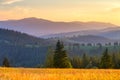 Autumn in mountains. Vivid mountain hills at the sunset.