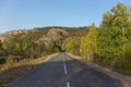 Autumn mountains, the winding road sign. Royalty Free Stock Photo