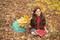 autumn nature. childhood happiness. back to school. kid with workbook. fall season fashion Royalty Free Stock Photo