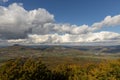 Autumn nature view from mountain to the horizont with hills and mountains and cloudy sky Royalty Free Stock Photo