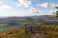 Autumn nature view from mountain to the horizont with hills and mountains and cloudy sky lookout in front Royalty Free Stock Photo