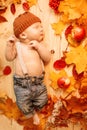 Autumn newborn. Autumn time scene. little baby with red yellow