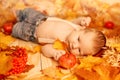 Autumn newborn. Autumn time scene. little baby with red yellow