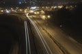 Autumn night light trails at entrance of the city.