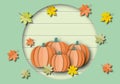 Autumn of orange pumpkins with colourful leaves on pastel wood banner background. Royalty Free Stock Photo