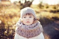 Autumn outdoor, toddler girl walking outdoors.