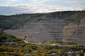 Autumn panorama overlooking a limestone quarry and limestone mining plant