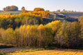 Autumn panoramic view of hill fields and meadows with forest surrounding Zagorzyce village in Podkarpacie region of Poland