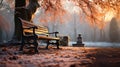 An autumn park with bench at morning fog in winter Royalty Free Stock Photo